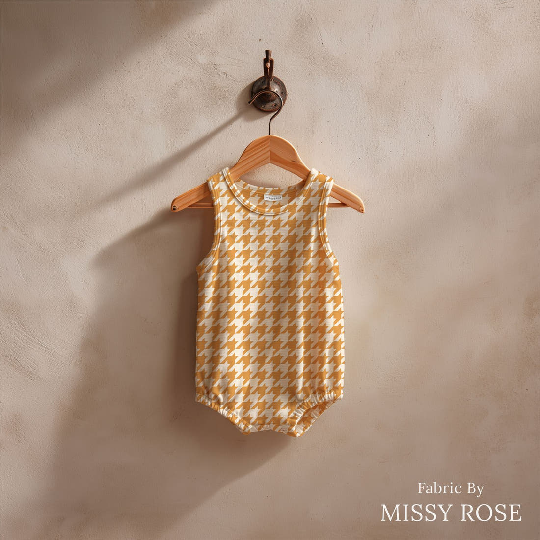 Indy Bloom Fabric Sucker For You Hounds Tooth in Golden 13 sewn into a baby romper - custom printed fabric | Fabric by Missy Rose