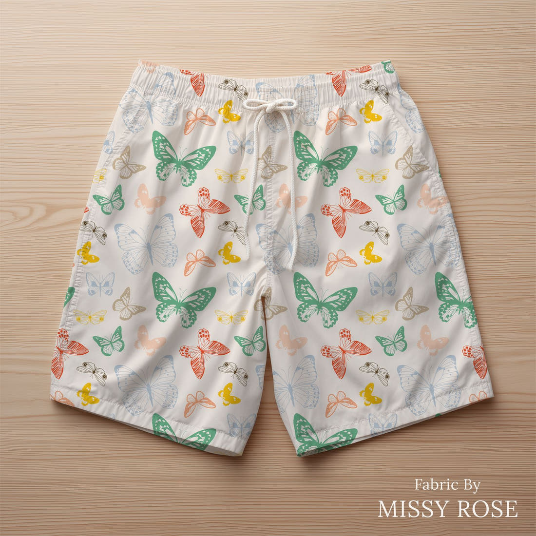 Indy Bloom Fabric Summer Sunshine Butterflies in Rainbow 13 sewn into swim shorts - custom printed fabric | Fabric by Missy Rose