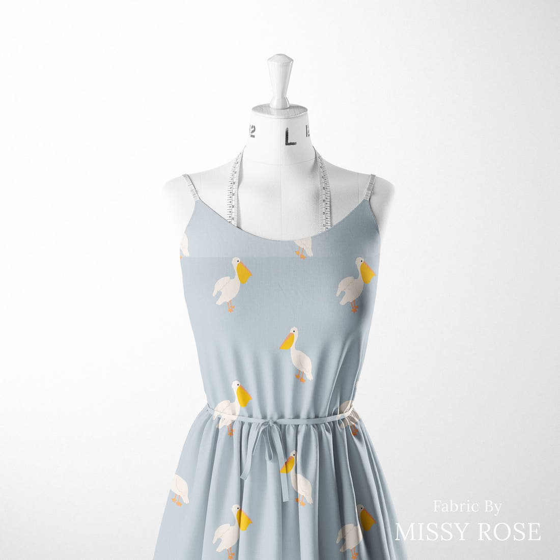 Indy Bloom Fabric Summer Sunshine Pelican in Periwinkle 08 sewn into a women's dress - custom printed fabric | Fabric by Missy Rose
